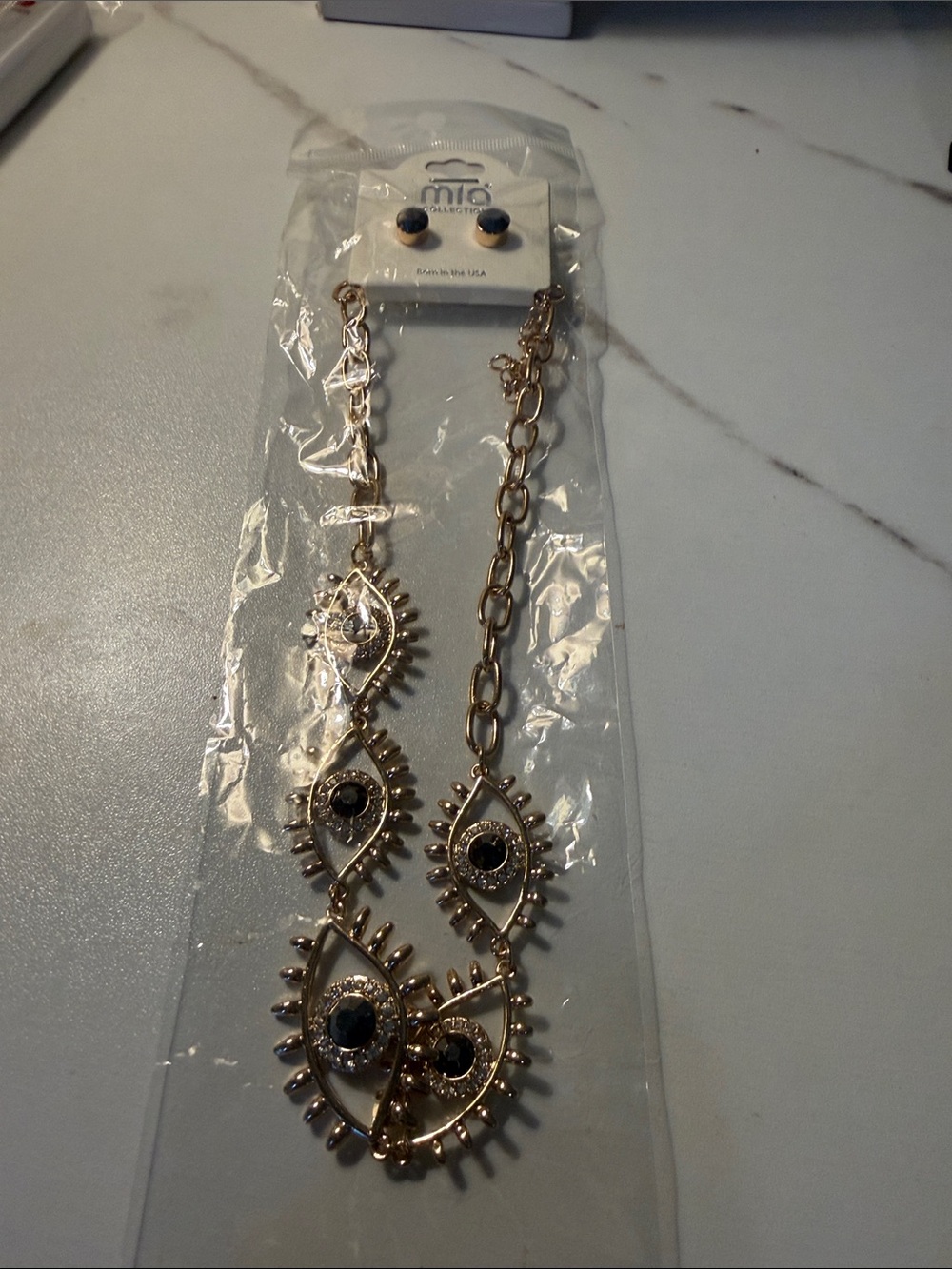Gold Tone Evil Eye Necklace with Black Stone Accents - Mia Collection